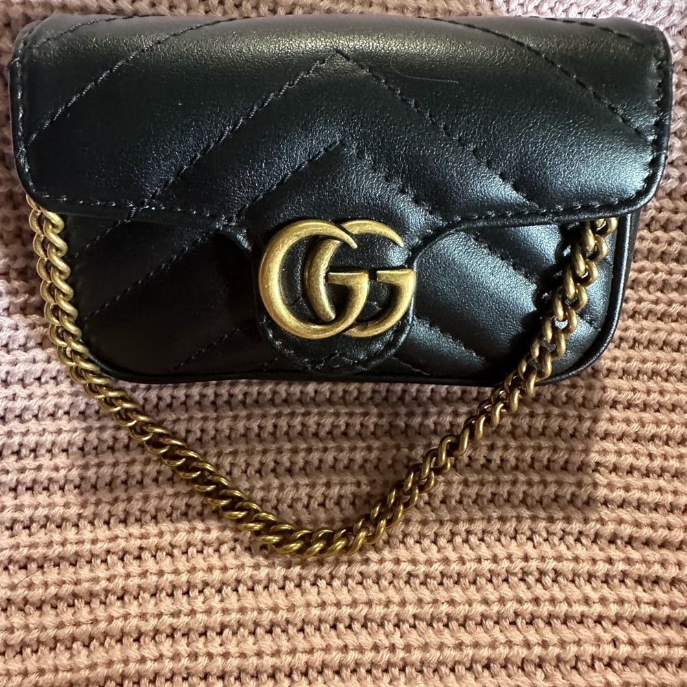 Gucci Black and Gold Mini Bag with Iconic GG Hardware